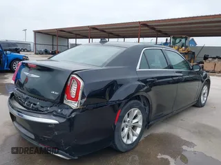 2016 Chrysler 300 Limited with VIN 2C3CCAAG7GH219523, listed as a IAAI auction lot 41932271 with 158,082 mi miles. Bid and sale history available at carsss.com. Image 4.
