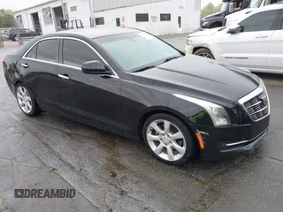 2015 Cadillac ATS Standard RWD z VIN 1G6AA5RA3F0124429, wystawiony jako IAAI lot #41958188 z przebiegiem 124 860 mil mil oraz . Historia ofert i sprzedaży dostępna na DreamBid. Obrazek 1.