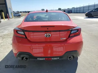 2023 Toyota GR86 with VIN JF1ZNBC16P8757253, listed as a Copart auction lot 69701694 with 10,024 mi miles and Salvage Title. Bid and sale history available at carsss.com. Image 6.