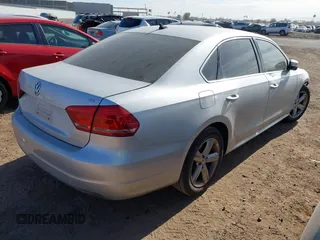 2013 Volkswagen Passat SE w/Sunroof & Nav with VIN 1VWBP7A35DC036516, listed as a IAAI auction lot 41545305 with 182,266 mi miles. Bid and sale history available at carsss.com. Image 4.