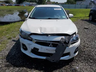 2017 Mitsubishi Lancer ES with VIN JA32V2FW8HU002843, listed as a Copart auction lot 65296254 with 67,310 mi miles and Salvage Title. Bid and sale history available at carsss.com. Image 5.