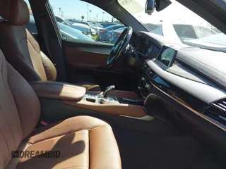 2018 BMW X6 xDrive35i with VIN 5UXKU2C5XJ0X50408, listed as a IAAI auction lot 41798784 with 69,134 mi miles. Bid and sale history available at carsss.com. Image 5.