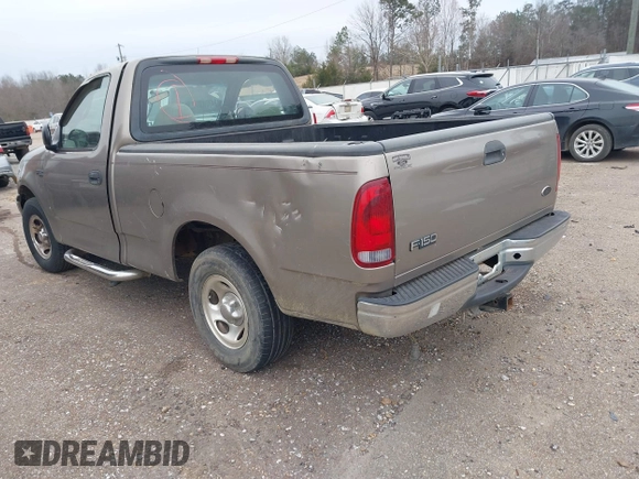 2002 Ford F-150 XL with VIN 3FTRF17212MA23970, listed as a IAAI auction lot 40991449 with 216,487 mi miles. Bid and sale history available at carsss.com. Image 3.