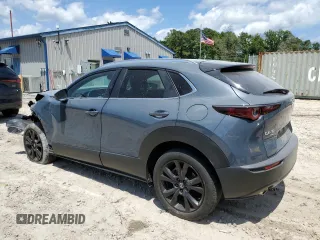 2022 Mazda CX-30 S Carbon Edition с VIN 3MVDMBCL0NM434395, выставлен на аукционе Copart как лот 56247715 с пробегом 40 698 миль миль и На запчасти • Non repairable. История ставок и продаж доступна на DreamBid. Изображение 2.