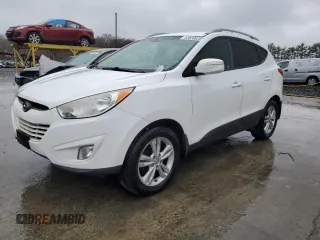 2013 Hyundai Tucson GLS with VIN KM8JU3AC0DU770079, listed as a Copart auction lot 52639835 with 212,894 mi miles and Clean Title. Bid and sale history available at carsss.com. Image 1.