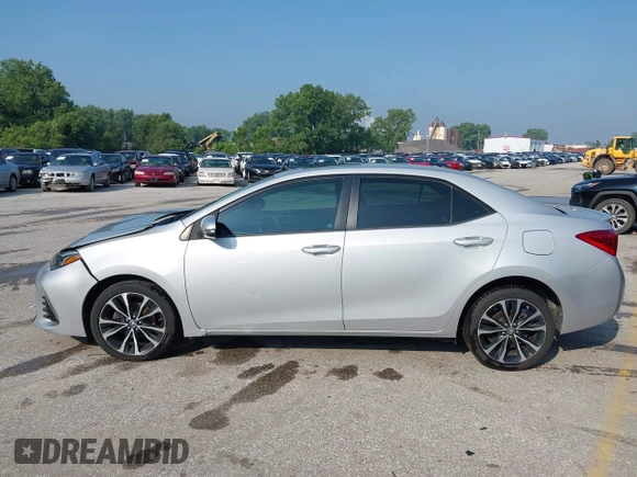 2017 Toyota Corolla L with VIN 2T1BURHE3HC925858, listed as a IAAI auction lot 42388175 with 101,057 mi miles and . Bid and sale history available at DreamBid. Image 14.