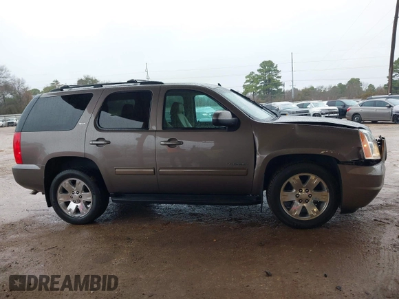 2014 GMC Yukon SLT with VIN 1GKS1CE00ER164663, listed as a IAAI auction lot 41547771 with 178,998 mi miles. Bid and sale history available at carsss.com. Image 13.