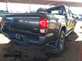 2017 Toyota Tacoma SR5 with VIN 3TMCZ5AN7HM104214, listed as a IAAI auction lot 41619808 with 48,236 mi miles and . Bid and sale history available at carsss.com. Image 4.