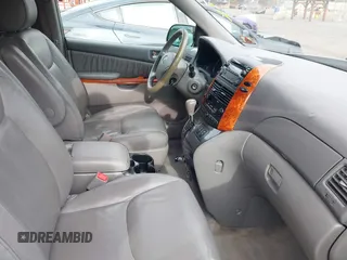 2008 Toyota Sienna XLE with VIN 5TDZK22C38S151671, listed as a IAAI auction lot 41046569 with 119,239 mi miles. Bid and sale history available at carsss.com. Image 5.