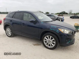 2015 Mazda CX-5 Grand Touring with VIN JM3KE4DY1F0480406, listed as a Copart auction lot 52349945 with 166,515 mi miles and Salvage Title. Bid and sale history available at carsss.com. Image 4.