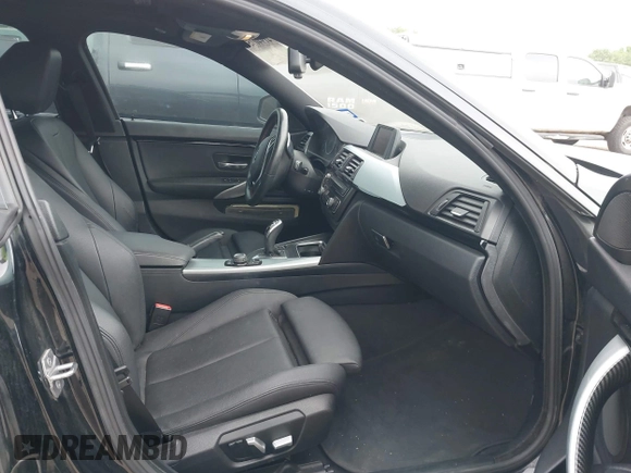 2016 BMW 4 Series 428i with VIN WBA4A9C51GG506512, listed as a IAAI auction lot 41940754 with 144,999 mi miles and . Bid and sale history available at DreamBid. Image 5.