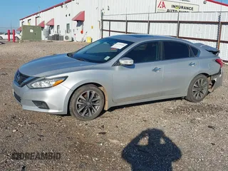 2016 Nissan Altima S with VIN 1N4AL3APXGC288696, listed as a IAAI auction lot 41209580 with 131,709 mi miles and . Bid and sale history available at carsss.com. Image 2.