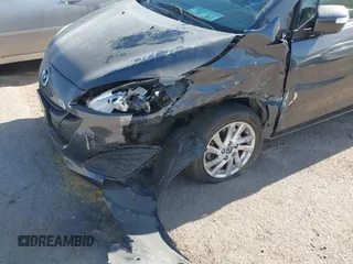 2013 Mazda 5 Sport with VIN JM1CW2BL4D0145725, listed as a IAAI auction lot 42190177 with 143,209 mi miles and . Bid and sale history available at DreamBid. Image 6.
