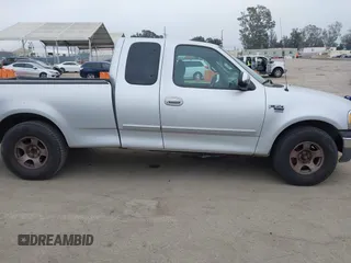 2000 Ford F-150 XL with VIN 1FTRX17W0YKA70861, listed as a IAAI auction lot 42096438 with 1 mi miles. Bid and sale history available at carsss.com. Image 13.