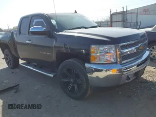 2013 Chevrolet Silverado 1500 LT with VIN 1GCRKSE77DZ267690, listed as a IAAI auction lot 41801357 with 70,964 mi miles and . Bid and sale history available at DreamBid. Image 1.