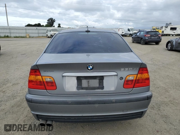 2004 BMW 3 Series 330xi with VIN WBAEW534X4PN33452, listed as a Copart auction lot 54746735 with 135,729 mi miles and Salvage title. Bid and sale history available at DreamBid. Image 6.