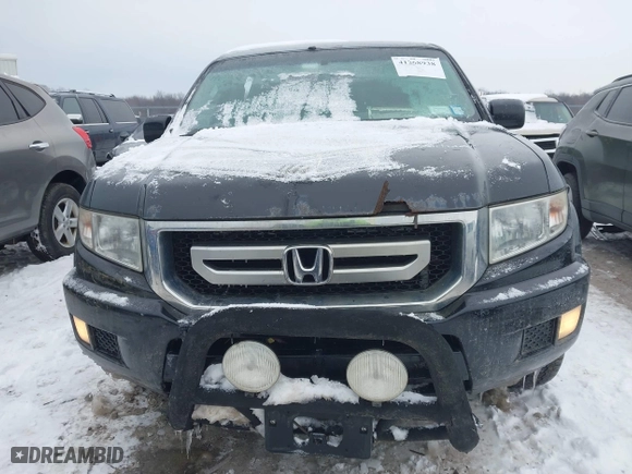 2011 Honda Ridgeline RTS with VIN 5FPYK1F48BB005889, listed as a IAAI auction lot 41268938 with 146,974 mi miles. Bid and sale history available at carsss.com. Image 12.