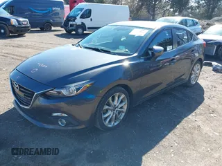 2014 Mazda 3 S Touring with VIN JM1BM1V37E1144331, listed as a IAAI auction lot 41880673 with 102,963 mi miles and . Bid and sale history available at DreamBid. Image 18.