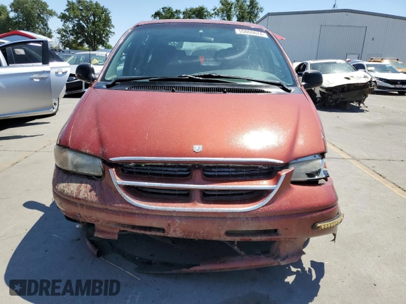 1999 Dodge Caravan with VIN 2B4FP25B0XR192013, listed as a Copart auction lot 55006624 with 195,008 mi miles and Salvage title. Bid and sale history available at DreamBid. Image 5.