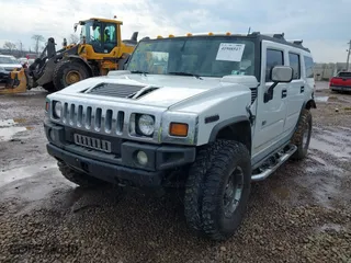 2004 Hummer H2 with VIN 5GRGN23U64H122670, listed as a IAAI auction lot 41908517 with 189,736 mi miles. Bid and sale history available at carsss.com. Image 2.