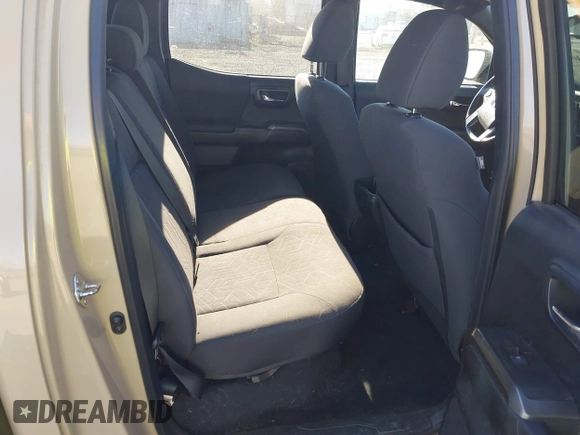 2018 Toyota Tacoma SR z VIN 3TMCZ5AN7JM125425, wystawiony jako IAAI lot #40459066 z przebiegiem 85 182 mil mil oraz . Historia ofert i sprzedaży dostępna na DreamBid. Obrazek 8.