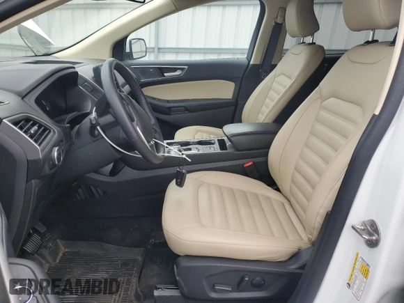 2024 Ford Edge SEL z VIN 2FMPK4J90RBA35500, wystawiony jako Copart lot #52715715 z przebiegiem Nie podano mil oraz Szkoda całkowita • Salvage title. Historia ofert i sprzedaży dostępna na DreamBid. Obrazek 7.