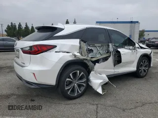 2019 Lexus RX 450h with VIN 2T2BGMCA4KC035015, listed as a Copart auction lot 50659345 with 84,408 mi miles and Salvage Title. Bid and sale history available at DreamBid. Image 3.