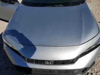 2025 Honda Civic Sport z VIN 19XFL2H82SE010045, wystawiony jako Copart lot #88132265 z przebiegiem 2007 mil mil oraz Szkoda całkowita • Salvage title. Historia ofert i sprzedaży dostępna na DreamBid. Obrazek 12.