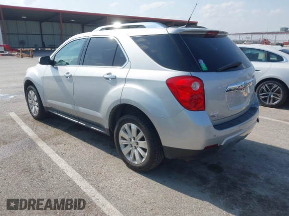 2011 Chevrolet Equinox 2LT z VIN 2CNFLNEC0B6287590, wystawiony jako IAAI lot #42123526 z przebiegiem 80 501 mil mil oraz . Historia ofert i sprzedaży dostępna na DreamBid. Obrazek 3.