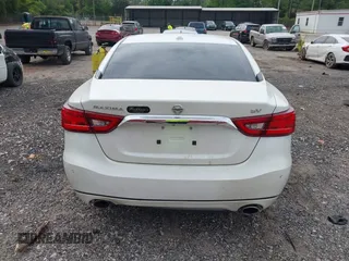 2016 Nissan Maxima SV z VIN 1N4AA6APXGC419665, wystawiony jako IAAI lot #42085939 z przebiegiem 158 000 mil mil oraz . Historia ofert i sprzedaży dostępna na DreamBid. Obrazek 17.