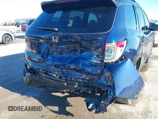 2023 Honda Passport Elite with VIN 5FNYF8H06PB012234, listed as a IAAI auction lot 41208146 with 38,491 mi miles and . Bid and sale history available at DreamBid. Image 6.