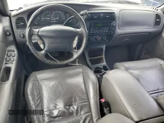 1999 Ford Explorer z VIN 1FMZU32X4XZB11031, wystawiony jako Copart lot #82640184 z przebiegiem 149 331 mil mil oraz Szkoda całkowita • Salvage title. Historia ofert i sprzedaży dostępna na DreamBid. Obrazek 8.
