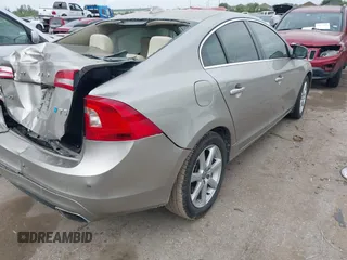 2016 Volvo S60 T5 Drive-E Premier with VIN YV126MFK0G2414153, listed as a IAAI auction lot 41931477 with 75,792 mi miles. Bid and sale history available at carsss.com. Image 4.