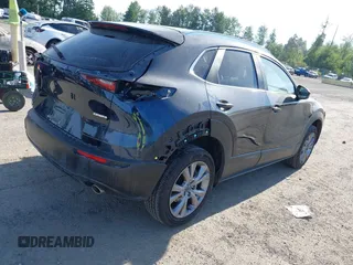 2023 Mazda CX-30 S Select with VIN 3MVDMBBM4PM558831, listed as a IAAI auction lot 42432750 with 12,468 mi miles and . Bid and sale history available at DreamBid. Image 4.