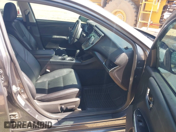 2018 Toyota Avalon XLE with VIN 4T1BK1EB1JU285770, listed as a IAAI auction lot 42073553 with 71,809 mi miles and . Bid and sale history available at DreamBid. Image 5.