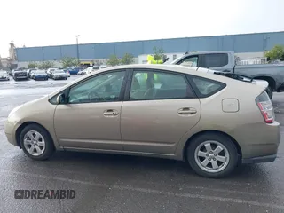 2005 Toyota Prius z VIN JTDKB20U253079310, wystawiony jako IAAI lot #41501954 z przebiegiem 160 728 mil mil oraz . Historia ofert i sprzedaży dostępna na DreamBid. Obrazek 14.