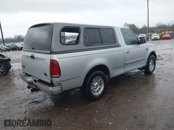 2003 Ford F-150 XL with VIN 1FTRF17W73NA72178, listed as a IAAI auction lot 41728356 with 207,708 mi miles and . Bid and sale history available at DreamBid. Image 4.