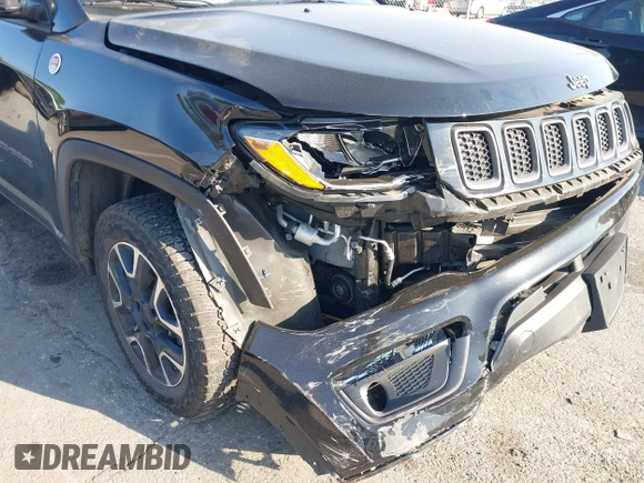 2019 Jeep Compass Trailhawk with VIN 3C4NJDDB5KT800515, listed as a IAAI auction lot 42059594 with 60,338 mi miles and . Bid and sale history available at DreamBid. Image 6.
