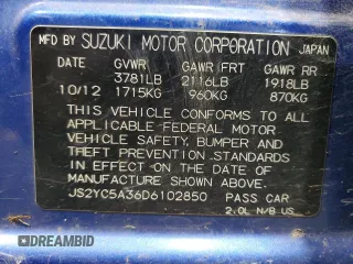 2013 Suzuki SX4 LE with VIN JS2YC5A36D6102850, listed as a Copart auction lot 82205134 with 70,776 mi miles and Salvage Title. Bid and sale history available at carsss.com. Image 12.