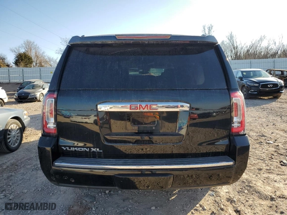 2016 GMC Yukon XL Denali with VIN 1GKS1HKJXGR443700, listed as a Copart auction lot 85327284 with 115,015 mi miles and Salvage Title. Bid and sale history available at carsss.com. Image 6.