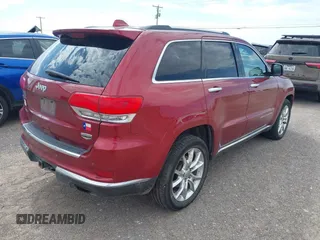 2014 Jeep Grand Cherokee Summit z VIN 1C4RJFJT4EC423217, wystawiony jako IAAI lot #42704059 z przebiegiem 245 928 mil mil oraz . Historia ofert i sprzedaży dostępna na DreamBid. Obrazek 4.