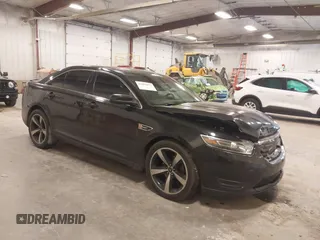2015 Ford Taurus SEL with VIN 1FAHP2H80FG133240, listed as a IAAI auction lot 41897873 with 189,059 mi miles. Bid and sale history available at carsss.com. Image 1.