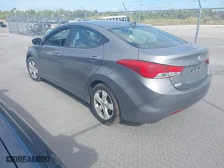 2013 Hyundai Elantra GLS PZEV with VIN KMHDH4AE9DU680860, listed as a IAAI auction lot 41068349 with 74,687 mi miles. Bid and sale history available at carsss.com. Image 3.