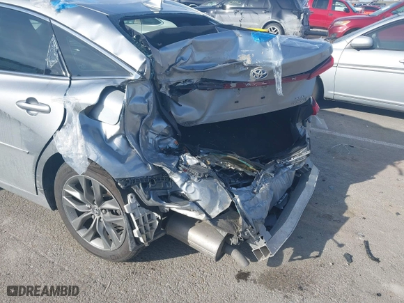 2019 Toyota Avalon Hybrid Limited with VIN 4T1B21FB8KU009988, listed as a IAAI auction lot 41424216 with 66,996 mi miles. Bid and sale history available at carsss.com. Image 6.