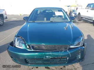 1999 Honda Civic VP with VIN 2HGEJ6617XH508270, listed as a IAAI auction lot 41319879 with 119,549 mi miles. Bid and sale history available at carsss.com. Image 6.