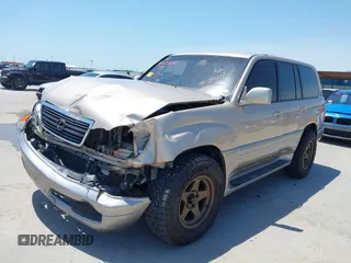 2000 Lexus LX 470 z VIN JT6HT00W4Y0114729, wystawiony jako IAAI lot #42227081 z przebiegiem 129 117 mil mil oraz . Historia ofert i sprzedaży dostępna na DreamBid. Obrazek 2.