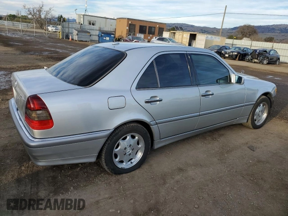 2000 Mercedes-Benz C 230 Kompressor with VIN WDBHA24GXYA802790, listed as a Copart auction lot 87460324 with 156,593 mi miles and Salvage Title. Bid and sale history available at carsss.com. Image 3.