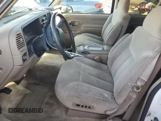 1999 GMC Yukon with VIN 1GKEC13R0XJ811710, listed as a Copart auction lot 43014995 with 311,948 mi miles and Salvage Title. Bid and sale history available at carsss.com. Image 7.