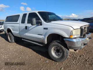 2002 Ford F-250 XL с VIN 1FTNX21F12EA84786, выставлен на аукционе Copart как лот 54698515 с пробегом 290 820 миль миль и Списание • Salvage title. История ставок и продаж доступна на DreamBid. Изображение 4.