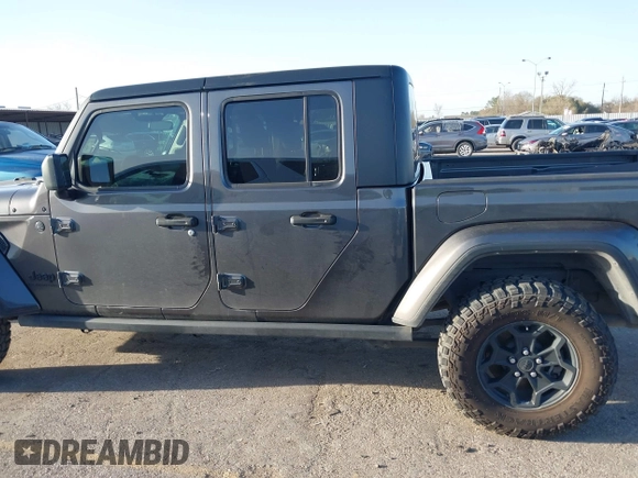 2022 Jeep Gladiator Texas Trail with VIN 1C6HJTAG7NL151184, listed as a IAAI auction lot 41614573 with 50,169 mi miles. Bid and sale history available at carsss.com. Image 14.